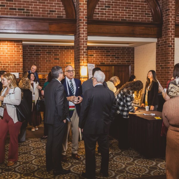 People networking at a business conference.