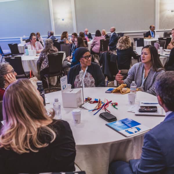 Group discussion at business conference event.